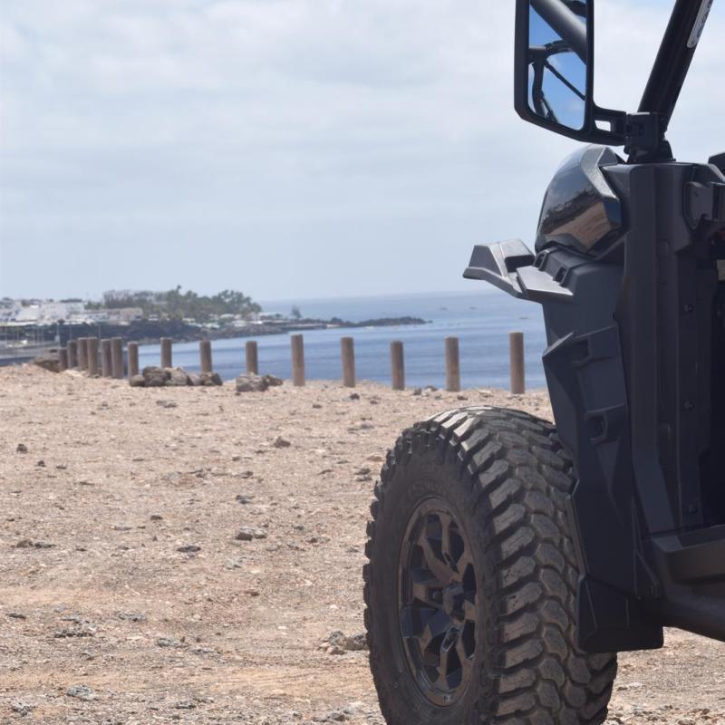 a tractor on a beach